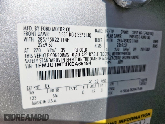 2019 Ford Expedition Platinum with VIN 1FMJU1MT4KEA65194, listed as a Copart auction lot 58161715 with 100,983 mi miles and Salvage title. Bid and sale history available at DreamBid. Image 13.