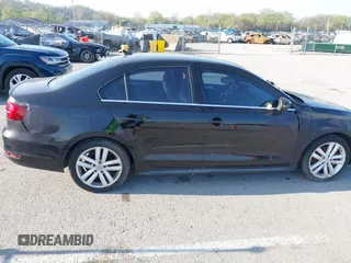 2013 Volkswagen Jetta GLI with VIN 3VW4S7AJ2DM300120, listed as a IAAI auction lot 42002950 with 106,304 mi miles and . Bid and sale history available at DreamBid. Image 6.