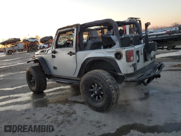 2007 Jeep Wrangler X with VIN 1J4FA24137L107083, listed as a Copart auction lot 88334565 with 156,689 mi miles and Salvage Title. Bid and sale history available at carsss.com. Image 2.