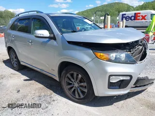 2012 Kia Sorento SX with VIN 5XYKWDA22CG272661, listed as a IAAI auction lot 42340802 with 198,249 mi miles and . Bid and sale history available at DreamBid. Image 1.