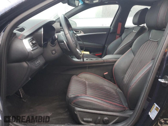 2023 Genesis G70 2.0T with VIN KMTG34TA5PU124271, listed as a Copart auction lot 82690964 with 8,844 mi miles and Salvage Title. Bid and sale history available at DreamBid. Image 7.