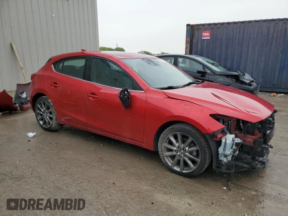 2018 Mazda 3 Touring z VIN 3MZBN1L39JM260754, wystawiony jako Copart lot #58514675 z przebiegiem 62 946 mil mil oraz Czysty tytuł • Clean title. Historia ofert i sprzedaży dostępna na DreamBid. Obrazek 4.