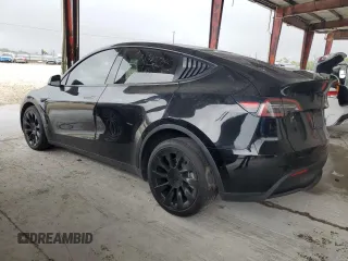 2022 Tesla Model Y Long Range z VIN 7SAYGDEE1NF393187, wystawiony jako Copart lot #56419535 z przebiegiem 82 757 mil mil oraz Nie do naprawy • Non repairable. Historia ofert i sprzedaży dostępna na DreamBid. Obrazek 2.