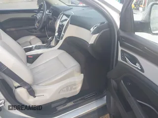 2015 Cadillac SRX Luxury Collection with VIN 3GYFNBE3XFS612048, listed as a IAAI auction lot 41923525 with 154,621 mi miles. Bid and sale history available at carsss.com. Image 5.