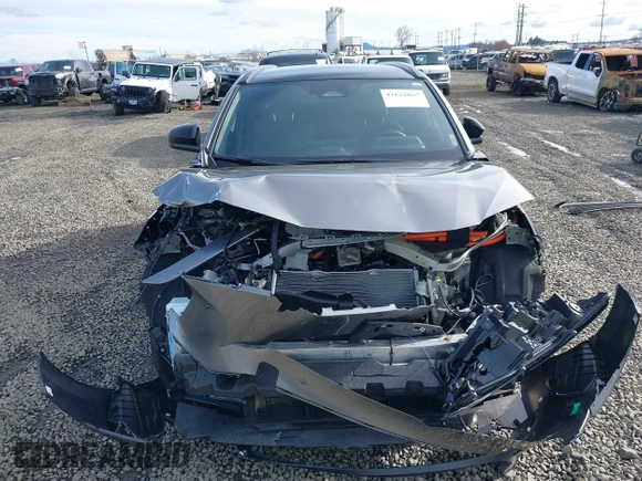 2024 Toyota bZ4X XLE z VIN JTMABACA2RA069207, wystawiony jako IAAI lot #41632667 z przebiegiem 7329 mil mil oraz . Historia ofert i sprzedaży dostępna na DreamBid. Obrazek 13.