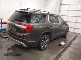 2020 GMC Acadia SLT with VIN 1GKKNULS8LZ154037, listed as a IAAI auction lot 42061743 with 54,657 mi miles and . Bid and sale history available at DreamBid. Image 4.