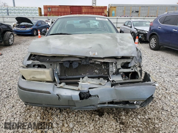 2004 Mercury Grand Marquis GS with VIN 2MEFM74W44X659873, listed as a Copart auction lot 51793205 with 115,384 mi miles and Salvage Title. Bid and sale history available at DreamBid. Image 5.