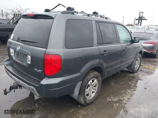 2005 Honda Pilot EX-L with NAVI with VIN 2HKYF18745H567671, listed as a IAAI auction lot 41577393 with 178,182 mi miles. Bid and sale history available at carsss.com. Image 4.