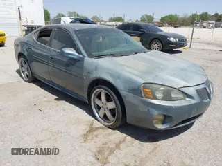 2007 Pontiac Grand Prix with VIN 2G2WP552771198026, listed as a IAAI auction lot 41908697 with 137,493 mi miles. Bid and sale history available at carsss.com. Image 1.