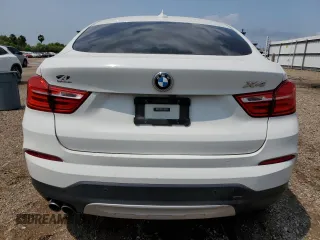2018 BMW X4 xDrive28i z VIN 5UXXW3C51J0Y65775, wystawiony jako Copart lot #54046785 z przebiegiem 94 287 mil mil oraz Szkoda całkowita • Salvage title. Historia ofert i sprzedaży dostępna na DreamBid. Obrazek 6.