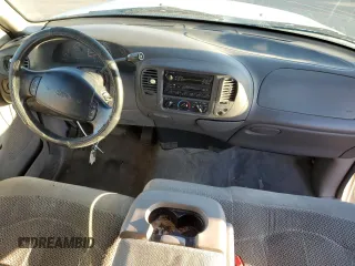 2000 Ford F-150 with VIN 1FTRX17W8YKB11043, listed as a Copart auction lot 77390664 with 181,439 mi miles and Salvage Title. Bid and sale history available at DreamBid. Image 8.