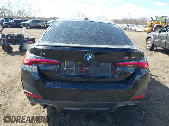 2024 BMW i4 xDrive40 z VIN WBY83FB04RFT19615, wystawiony jako IAAI lot #41679918 z przebiegiem 3 883 mil mil oraz . Historia ofert i sprzedaży dostępna na DreamBid. Obrazek 16.