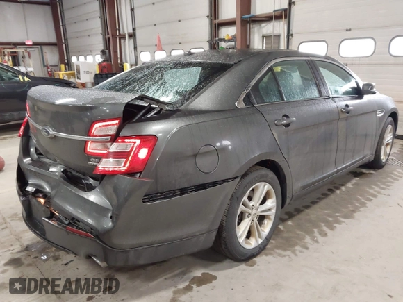 2015 Ford Taurus SEL with VIN 1FAHP2E87FG207029, listed as a IAAI auction lot 41752890 with 119,858 mi miles and . Bid and sale history available at carsss.com. Image 4.