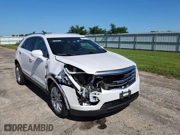 2017 Cadillac XT5 FWD z VIN 1GYKNARS2HZ173122, wystawiony jako Copart lot #63027715 z przebiegiem 130 467 mil mil oraz Czysty tytuł • Clean title. Historia ofert i sprzedaży dostępna na DreamBid. Obrazek 14.