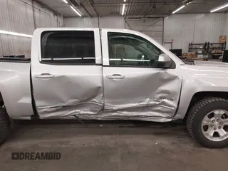 2017 Chevrolet Silverado 1500 LT with VIN 3GCUKREC5HG318772, listed as a IAAI auction lot 42056116 with 82,987 mi miles and . Bid and sale history available at DreamBid. Image 6.