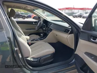 2016 Kia Optima LX with VIN KNAGT4L37G5073752, listed as a IAAI auction lot 42132621 with 136,818 mi miles. Bid and sale history available at carsss.com. Image 5.