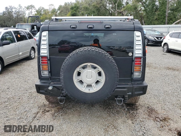2003 Hummer H2 with VIN 5GRGN23U93H111760, listed as a Copart auction lot 79600154 with 154,552 mi miles and Salvage Title. Bid and sale history available at carsss.com. Image 6.