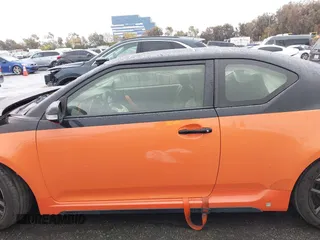 2015 Scion tC with VIN JTKJF5C79FJ007842, listed as a IAAI auction lot 41560881 with 155,436 mi miles. Bid and sale history available at carsss.com. Image 14.
