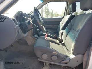 2004 Nissan Frontier XE with VIN 1N6ED29X94C423389, listed as a Copart auction lot 57357255 with 195,700 mi miles and Salvage title. Bid and sale history available at DreamBid. Image 7.