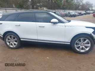 2020 Land Rover Range Rover Velar S z VIN SALYB2EX4LA238438, wystawiony jako IAAI lot #41504741 z przebiegiem 62 665 mil mil oraz . Historia ofert i sprzedaży dostępna na DreamBid. Obrazek 14.