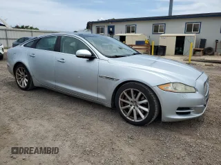 2011 Jaguar XJ with VIN SAJWA1CB9BLV05595, listed as a Copart auction lot 54947855 with 39,516 mi miles and Salvage title. Bid and sale history available at DreamBid. Image 4.