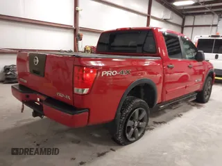2012 Nissan Titan SV with VIN 1N6AA0EC7CN327973, listed as a IAAI auction lot 41841596 with 148,519 mi miles. Bid and sale history available at carsss.com. Image 4.
