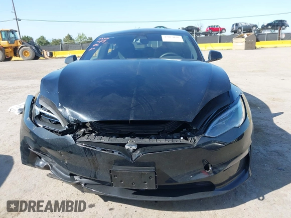 2023 Tesla Model S with VIN 5YJSA1E54PF531021, listed as a IAAI auction lot 42014104 with Not provided miles and . Bid and sale history available at DreamBid. Image 12.