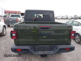 2022 Jeep Gladiator Texas Trail z VIN 1C6HJTAG1NL105124, wystawiony jako IAAI lot #42601707 z przebiegiem 52 064 mil mil oraz . Historia ofert i sprzedaży dostępna na DreamBid. Obrazek 16.