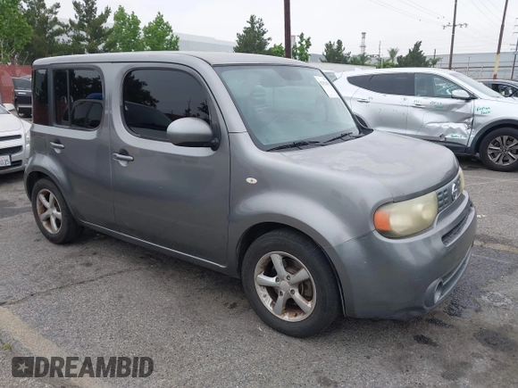 2010 Nissan Cube S z VIN JN8AZ2KR9AT153627, wystawiony jako IAAI lot #42352451 z przebiegiem 184 305 mil mil oraz . Historia ofert i sprzedaży dostępna na DreamBid. Obrazek 1.
