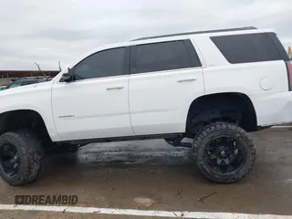 2019 GMC Yukon SLT with VIN 1GKS2BKC1KR167766, listed as a IAAI auction lot 41902532 with 97,793 mi miles. Bid and sale history available at carsss.com. Image 14.