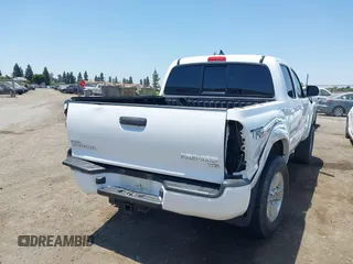 2014 Toyota Tacoma PreRunner z VIN 3TMJU4GN1EM159700, wystawiony jako IAAI lot #42460264 z przebiegiem 93 891 mil mil oraz . Historia ofert i sprzedaży dostępna na DreamBid. Obrazek 4.