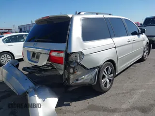 2005 Honda Odyssey TOURING with VIN 5FNRL38865B128519, listed as a IAAI auction lot 41830182 with 171,010 mi miles. Bid and sale history available at carsss.com. Image 4.