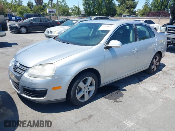 2009 Volkswagen Jetta SE with VIN 3VWRZ71KX9M039028, listed as a IAAI auction lot 42571072 with 112,389 mi miles and . Bid and sale history available at DreamBid. Image 2.