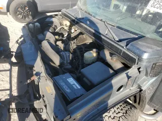 2005 Hummer H2 SUV with VIN 5GRGN23U25H115698, listed as a Copart auction lot 82569874 with 143,367 mi miles and Salvage Title. Bid and sale history available at carsss.com. Image 12.