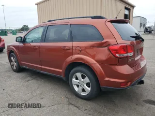 2012 Dodge Journey SXT with VIN 3C4PDDBG1CT241674, listed as a Copart auction lot 65224625 with 205,143 mi miles and Salvage title. Bid and sale history available at DreamBid. Image 2.