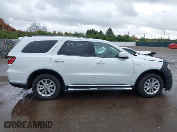 2015 Dodge Durango SXT with VIN 1C4RDJAG8FC239977, listed as a IAAI auction lot 40764725 with 133,809 mi miles and . Bid and sale history available at carsss.com. Image 14.