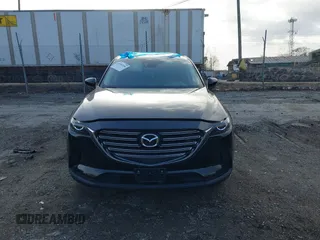 2017 Mazda CX-9 Touring with VIN JM3TCBCY5H0142400, listed as a IAAI auction lot 40987166 with 118,000 mi miles. Bid and sale history available at carsss.com. Image 11.