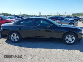 2016 Dodge Charger SE with VIN 2C3CDXBG7GH327767, listed as a IAAI auction lot 41783660 with 122,754 mi miles and . Bid and sale history available at carsss.com. Image 13.