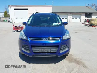 2016 Ford Escape SE with VIN 1FMCU9GX1GUB28870, listed as a IAAI auction lot 42129628 with 113,909 mi miles. Bid and sale history available at carsss.com. Image 12.