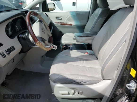 2011 Toyota Sienna XLE with VIN 5TDDK3DC6BS016463, listed as a Copart auction lot 58958305 with 270,424 mi miles and Salvage title. Bid and sale history available at DreamBid. Image 7.