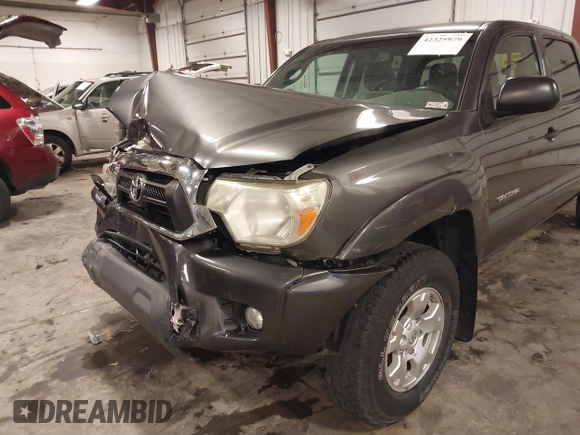 2013 Toyota Tacoma with VIN 3TMMU4FN9DM052987, listed as a IAAI auction lot 42325979 with 200,379 mi miles and . Bid and sale history available at DreamBid. Image 18.