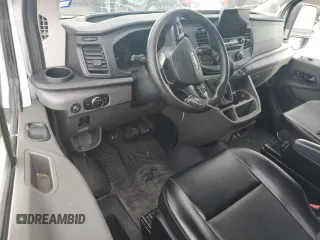 2021 Ford Transit Cargo with VIN 1FTBR1C81MKA78027, listed as a Copart auction lot 79514004 with Not Provided miles and Salvage Title. Bid and sale history available at DreamBid. Image 8.