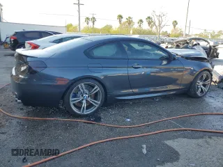 2015 BMW M6 z VIN WBSLX9C59FD160716, wystawiony jako Copart lot #47144925 z przebiegiem 55 535 mil mil oraz Szkody całkowita. Historia ofert i sprzedaży dostępna na DreamBid. Obrazek 3.