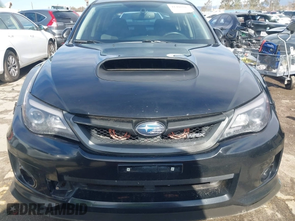 2014 Subaru Impreza Sedan WRX WRX Premium with VIN JF1GV7F6XEG011659, listed as a IAAI auction lot 41408915 with 133,836 mi miles. Bid and sale history available at carsss.com. Image 12.