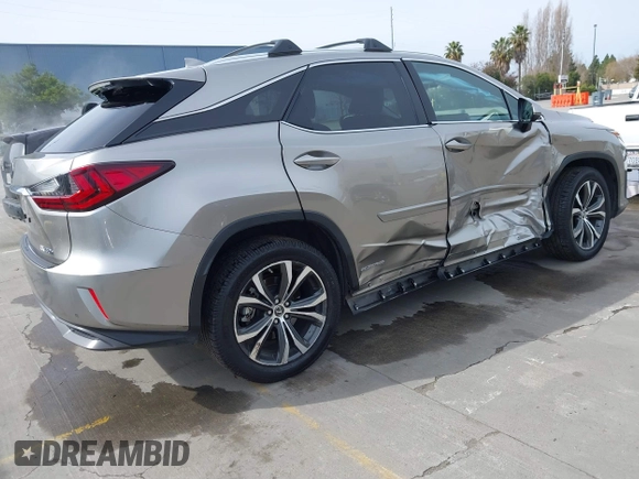 2019 Lexus RX with VIN 2T2BGMCA9KC033583, listed as a IAAI auction lot 41507244 with 67,484 mi miles. Bid and sale history available at carsss.com. Image 4.
