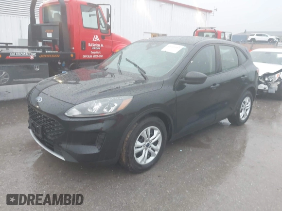 2020 Ford Escape S with VIN 1FMCU0F66LUB67615, listed as a IAAI auction lot 42161163 with 56,819 mi miles and . Bid and sale history available at DreamBid. Image 2.