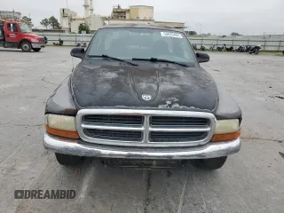 2002 Dodge Dakota с VIN 1B7FL46XX2S511526, выставлен на аукционе Copart как лот 57955594 с пробегом 244 367 миль миль и Списание • Salvage title. История ставок и продаж доступна на DreamBid. Изображение 5.