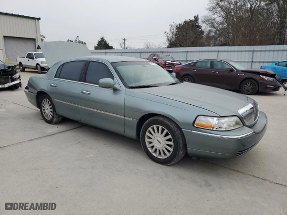 2004 Lincoln Town Car Signature with VIN 1LNHM81W34Y607067, listed as a Copart auction lot 42413965 with 106,973 mi miles and Salvage Title. Bid and sale history available at carsss.com. Image 4.
