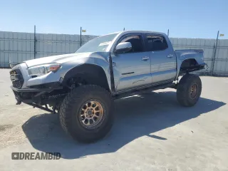 2017 Toyota Tacoma SR5 with VIN 3TMCZ5AN1HM079004, listed as a Copart auction lot 62506455 with 120,915 mi miles and Salvage title. Bid and sale history available at DreamBid. Image 1.