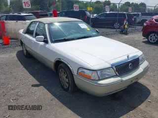 2004 Mercury Grand Marquis GS with VIN 2MEFM74W44X673224, listed as a IAAI auction lot 40670734 with 83,219 mi miles and . Bid and sale history available at DreamBid. Image 1.